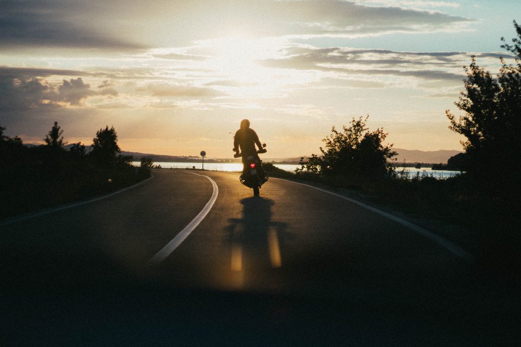 A motorcyclist should hire a motorcycle accident attorney in case of an accident, even on an open road like this.